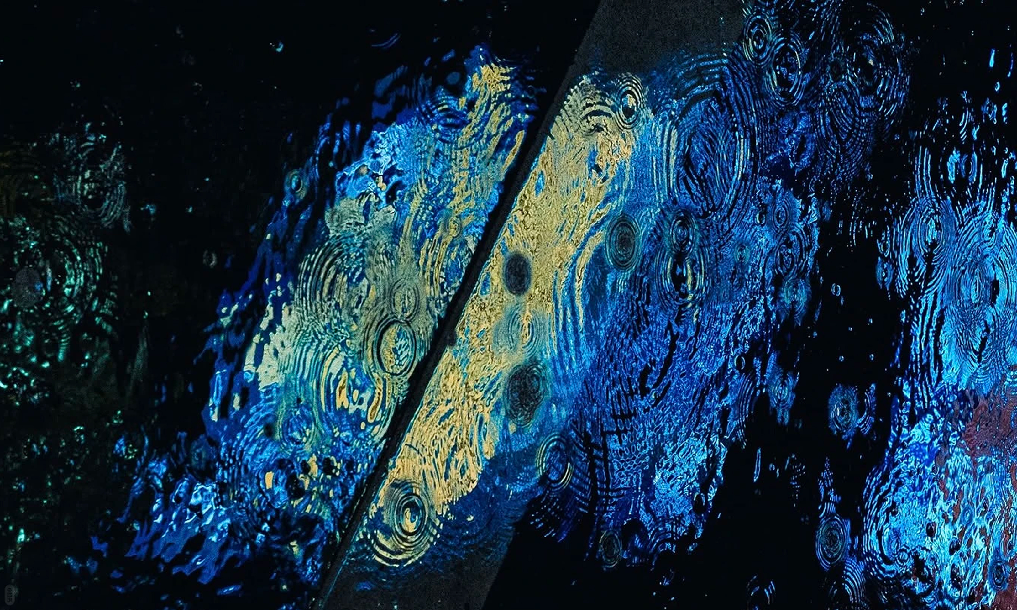 Blue and gold reflections in the rain